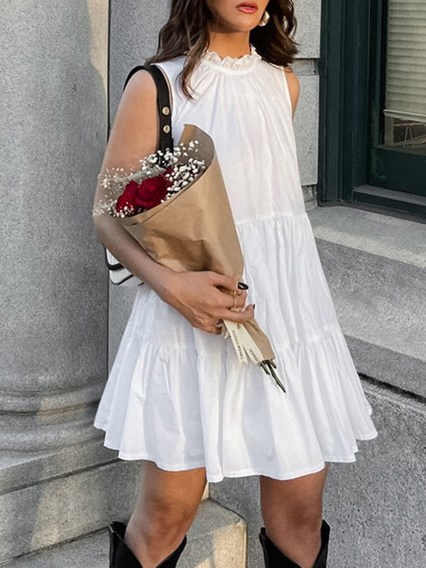 Robe chemise ample plissée volantée coupe trapèze, à empiècements, à col rond, couleur unie