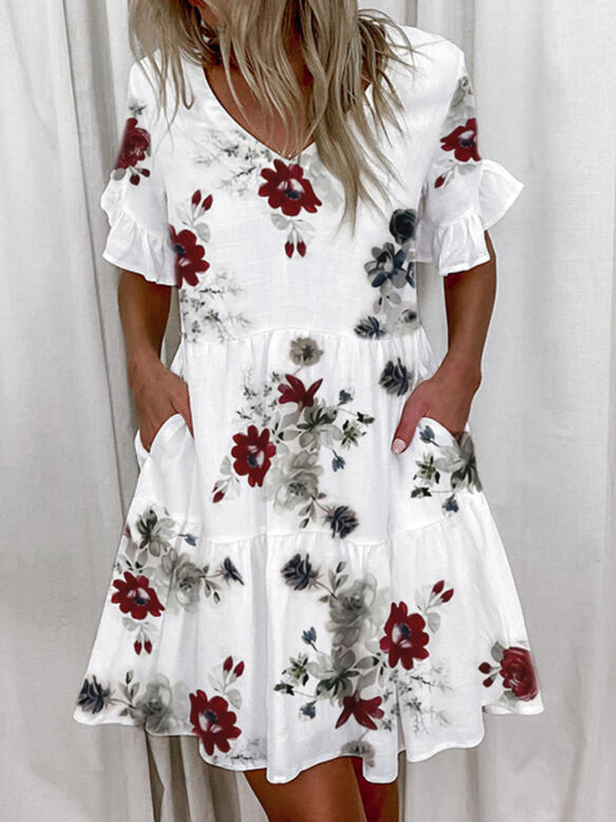 Robe mi-longue plissée imprimée coupe trapèze, taille haute, à poches, à empiècements, à col en V, couleur contrastée