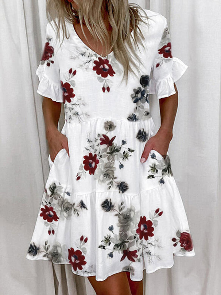 Robe mi-longue plissée imprimée coupe trapèze, taille haute, à poches, à empiècements, à col en V, couleur contrastée