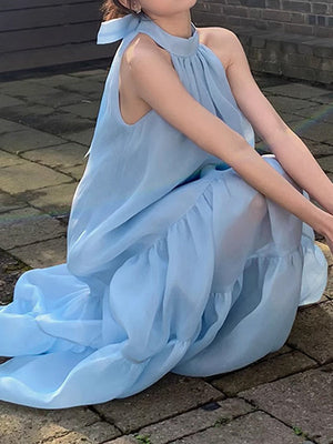 Robe mi-longue ample sans manches, à col licou, couleur unie