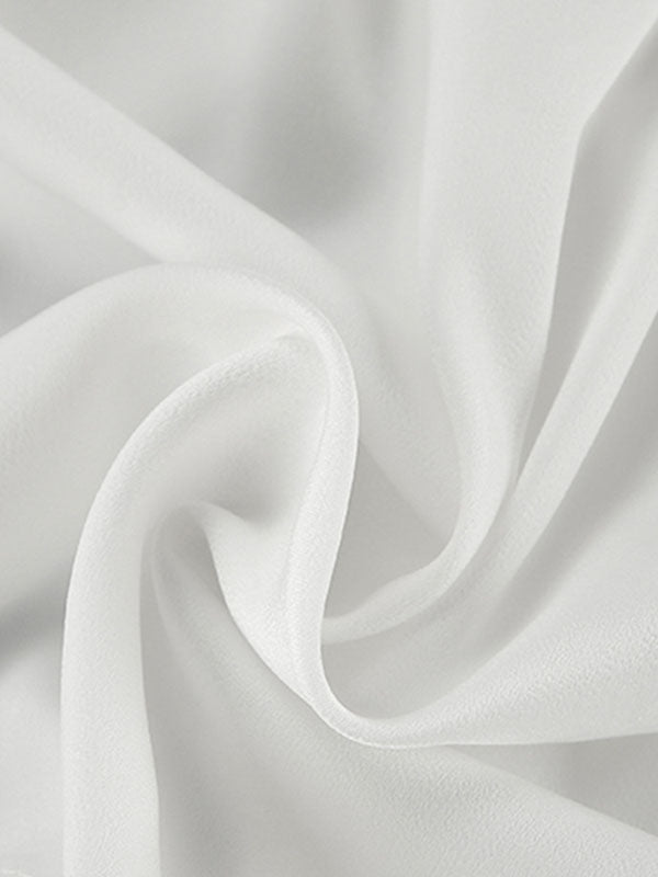 Chemisier ample plissé à manches bouffantes, à taille élastique, à empiècements, à col en V, couleur unie