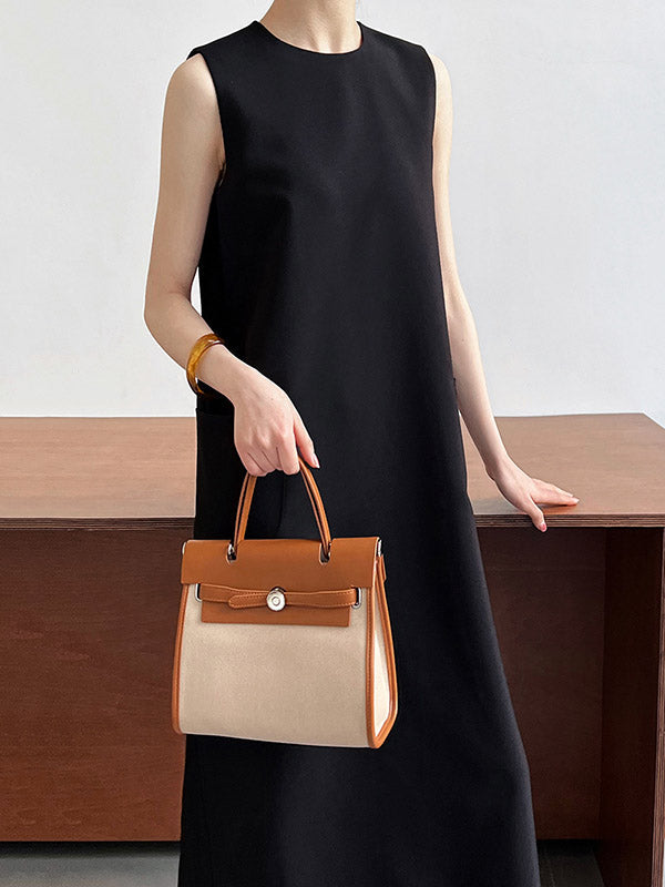 Robe mi-longue ample fendue dans le dos taille haute, à poches, à fermeture éclair, à col rond, couleur unie