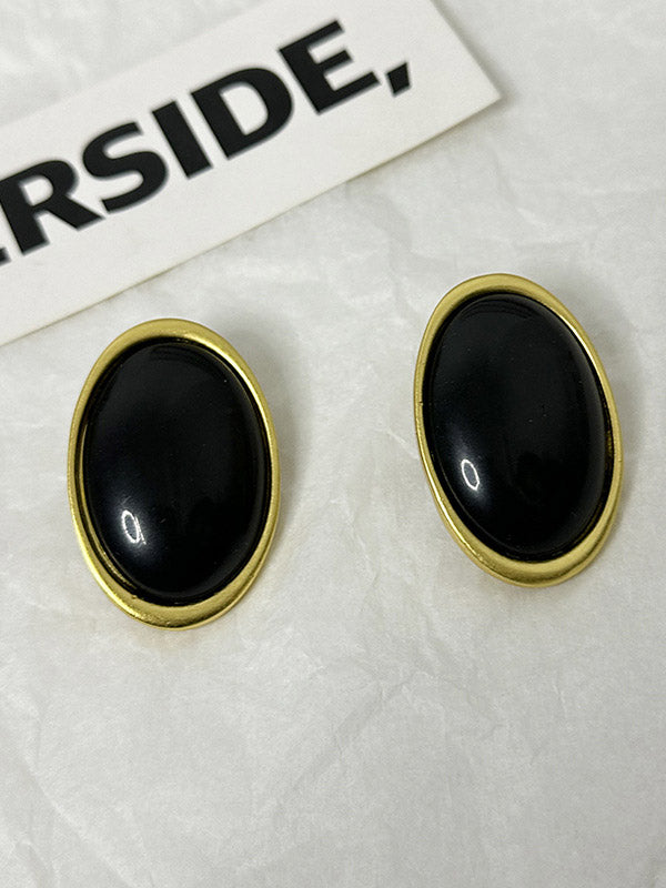 Boucles d'oreilles géométriques à empiècements