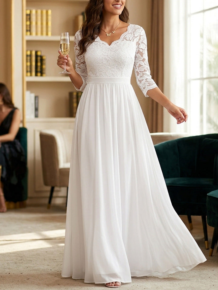 Robe longue plissée transparente coupe trapèze, taille haute, à empiècements, à col en V, couleur unie