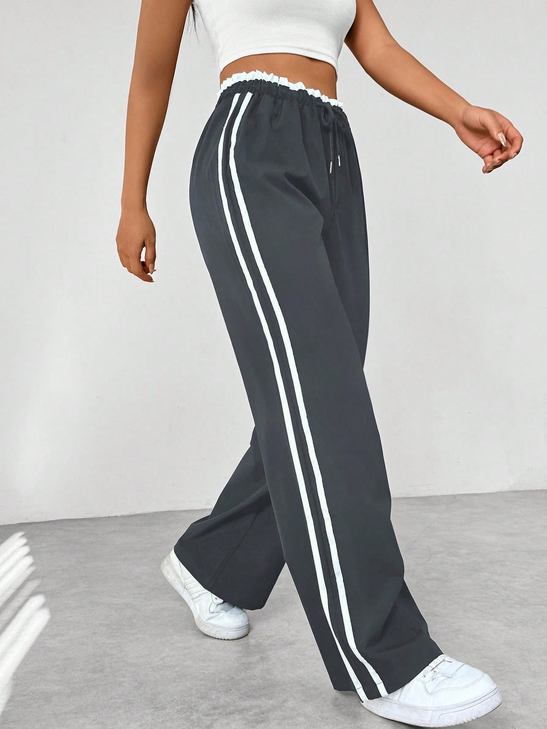 Pantalon en tissu ajustable à jambes larges pour femmes