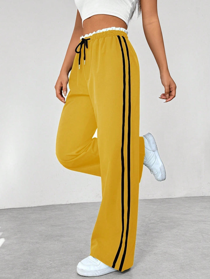 Pantalon en tissu ajustable à jambes larges pour femmes