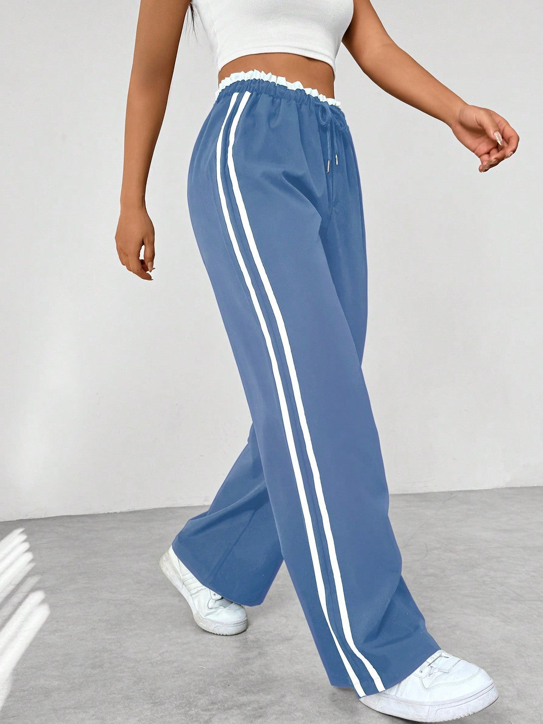 Pantalon en tissu ajustable à jambes larges pour femmes