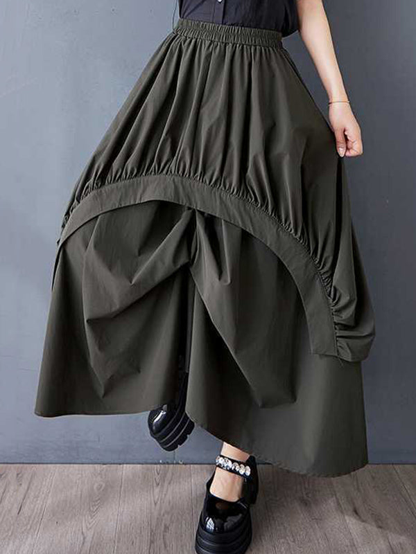 Jupe ample asymétrique plissée coupe trapèze, à taille élastique, à poches, couleur unie