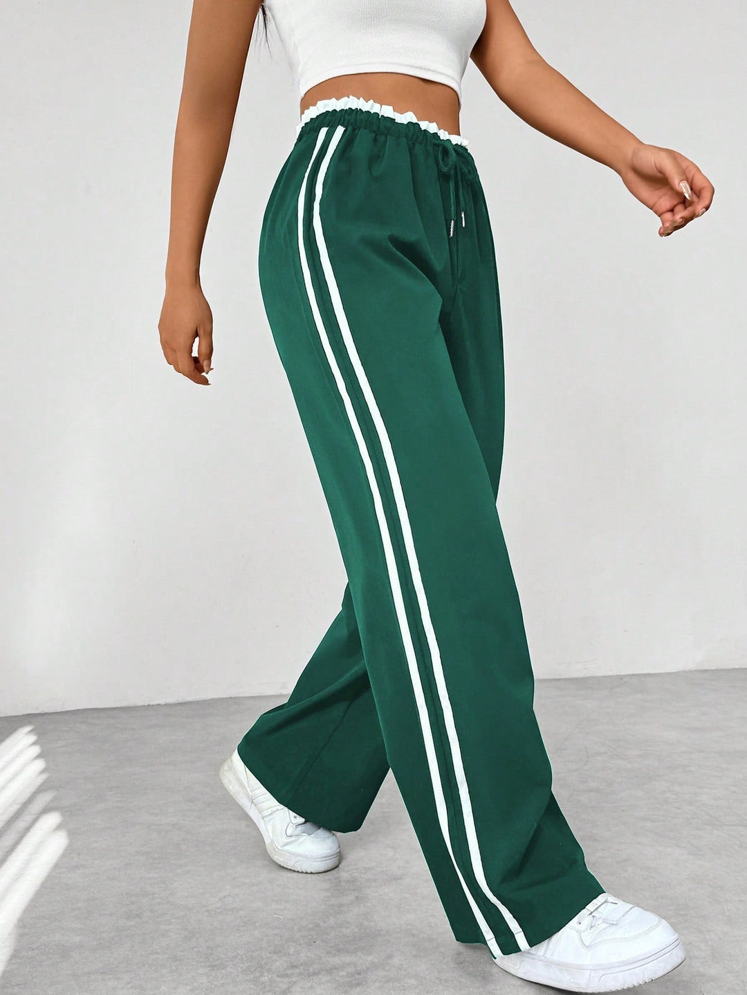 Pantalon en tissu ajustable à jambes larges pour femmes
