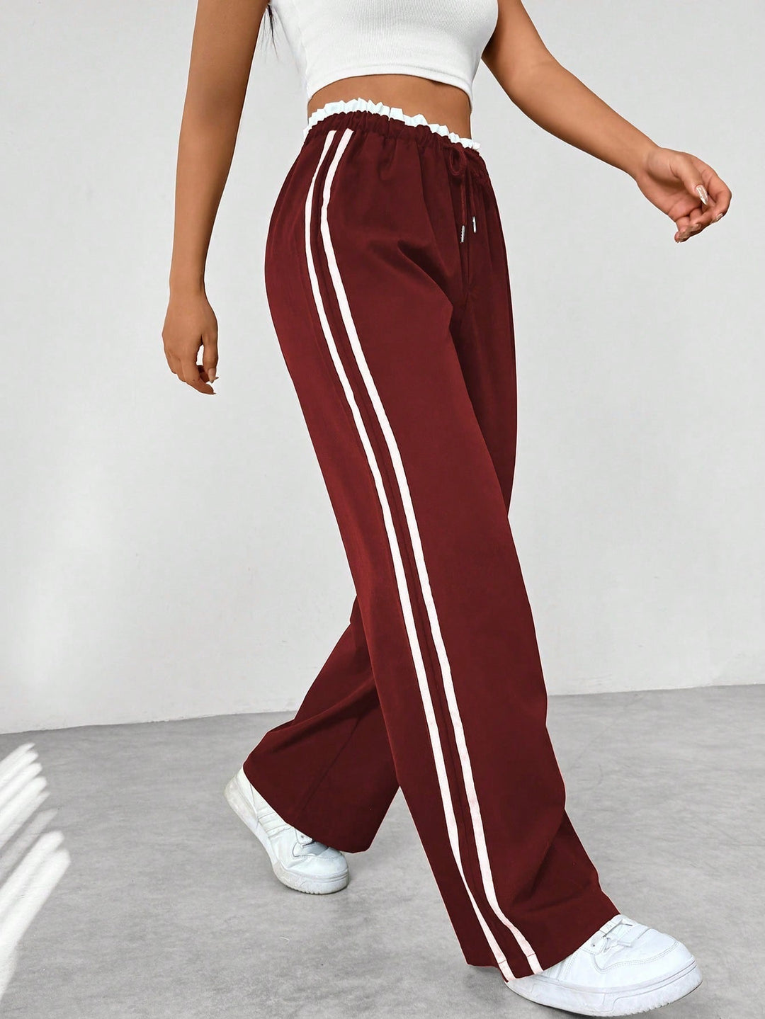 Pantalon en tissu ajustable à jambes larges pour femmes