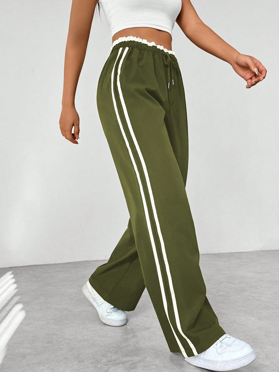 Pantalon en tissu ajustable à jambes larges pour femmes