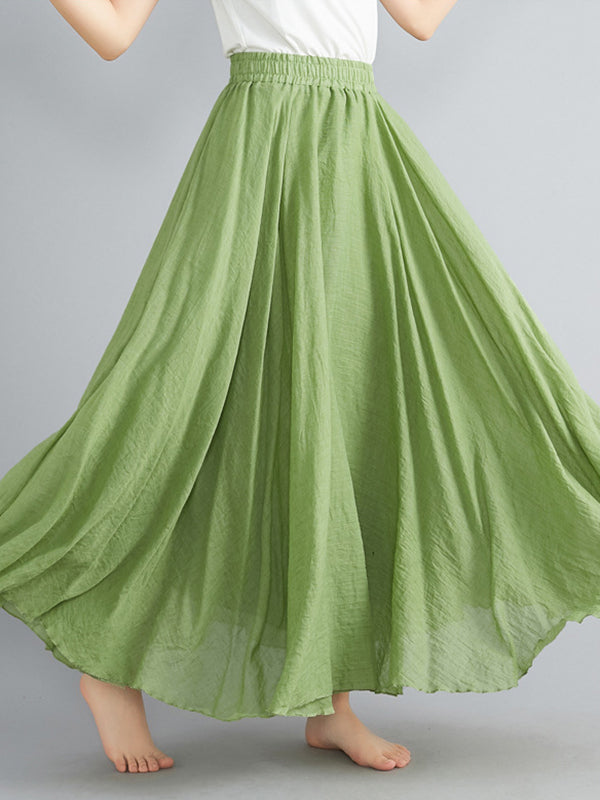 Jupe ample plissée coupe trapèze, à taille élastique, couleur unie