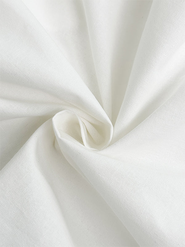 Combinaison ample boutonnée à manches courtes, à poches, à col en V, couleur unie
