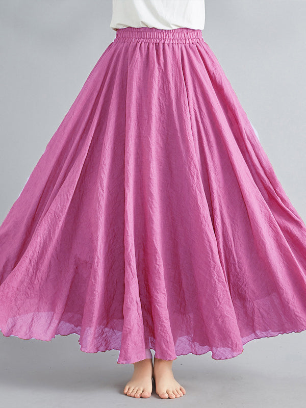 Jupe ample plissée coupe trapèze, à taille élastique, couleur unie