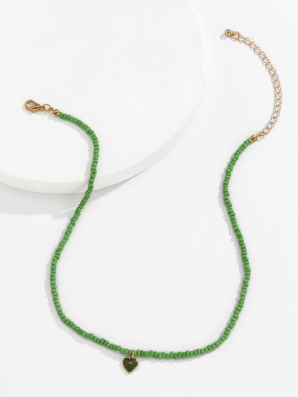 Collier à perles, couleur unie