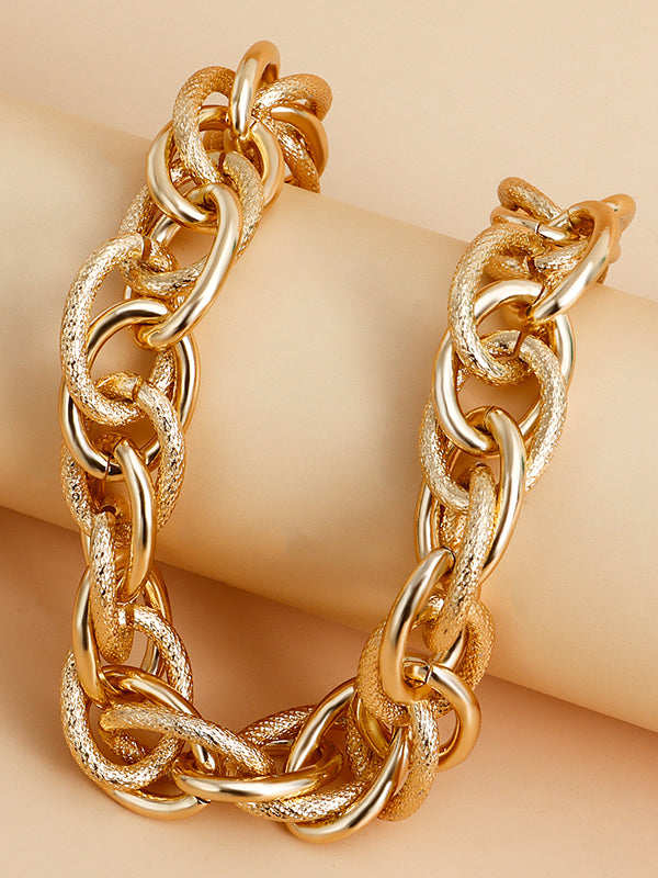 Parure collier et bracelet ajourée couleur unie