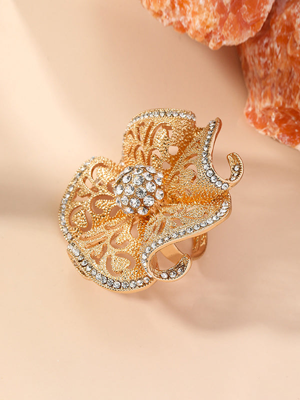 Bague réglable ajourée en forme de fleur, à strass