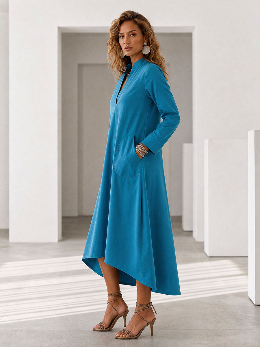 Robe mi-longue ample à poches, à manches longues, à col en V, couleur unie