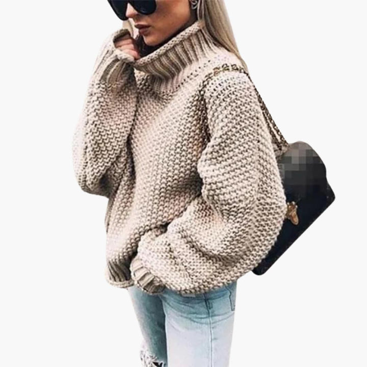 Pull femme à col roulé et surface tricotée structurée