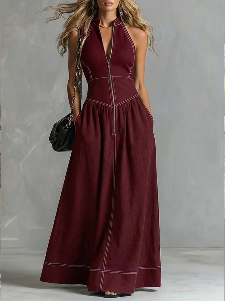 Robe longue plissée coupe trapèze, taille haute, à poches, à fermeture éclair, à col montant, couleur unie