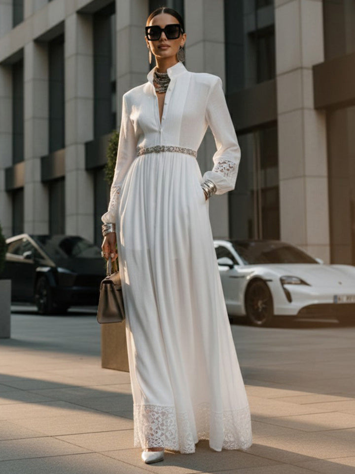 Robe chemise boutonnée ajourée plissée coupe trapèze, taille haute, avec ceinture, à poches, à empiècements, à col montant, couleur unie