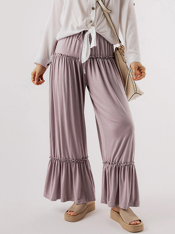 Pantalon ample plissé taille haute, couleur unie