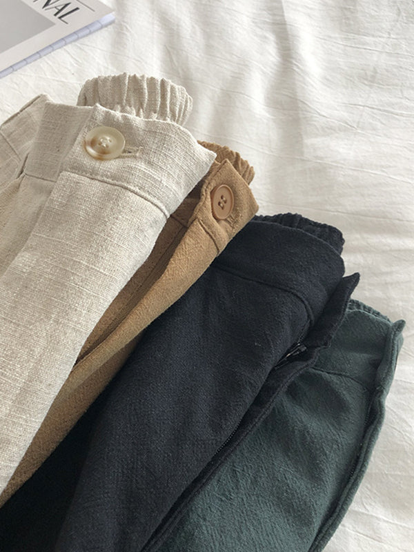 Short ample plissé à jambes larges, à taille élastique, couleur unie