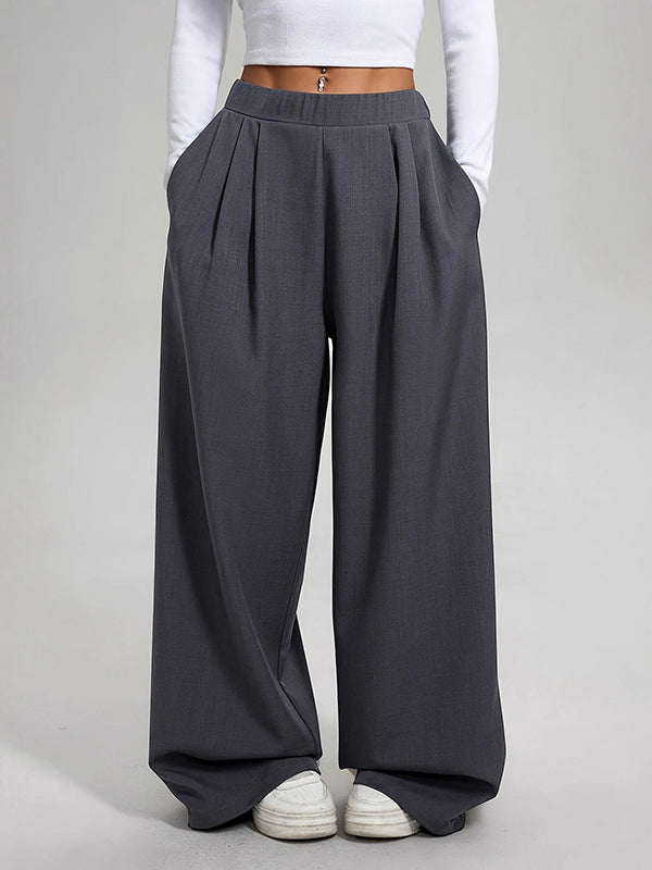 Pantalon ample plissé taille haute, à poches, couleur unie