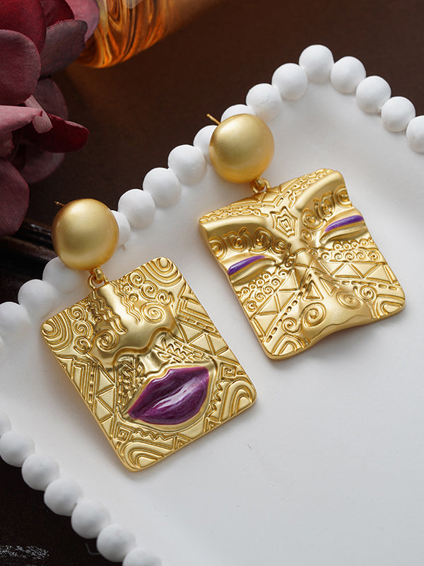 Boucles d'oreilles asymétriques gaufrées