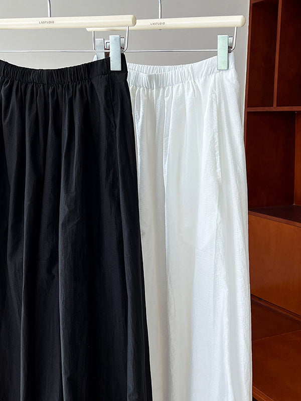 Pantalon taille haute, à taille élastique, à empiècements, couleur unie