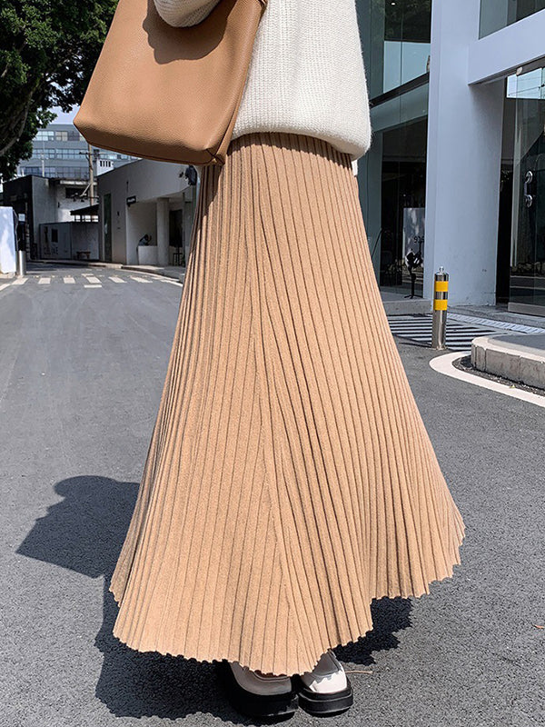 Jupe plissée coupe trapèze, taille haute, couleur unie