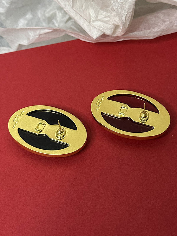 Boucles d'oreilles géométriques à empiècements