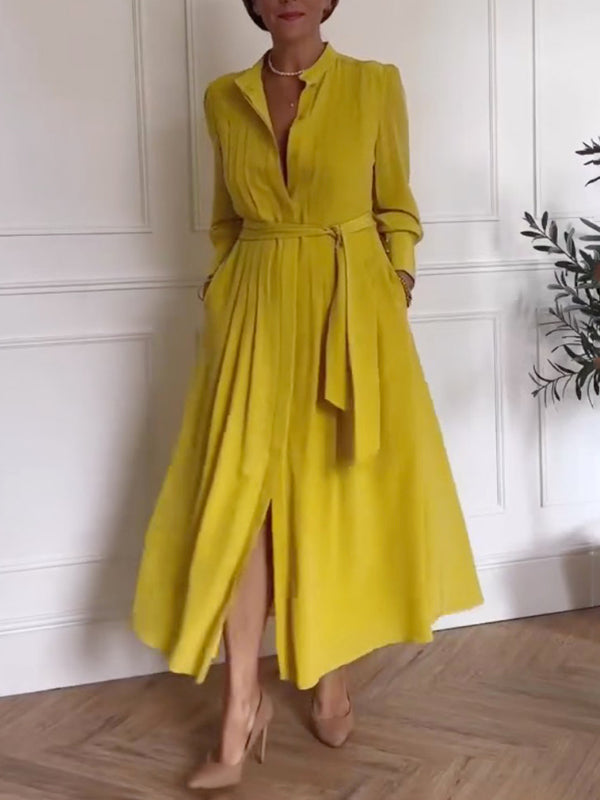 Robe longue boutonnée plissée coupe trapèze, à manches longues, à poches, à taille nouée, à col en V, couleur unie
