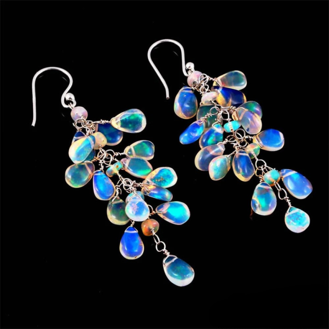 Lunaria – Boucles d'oreilles en forme de feuilles avec pierre de lune