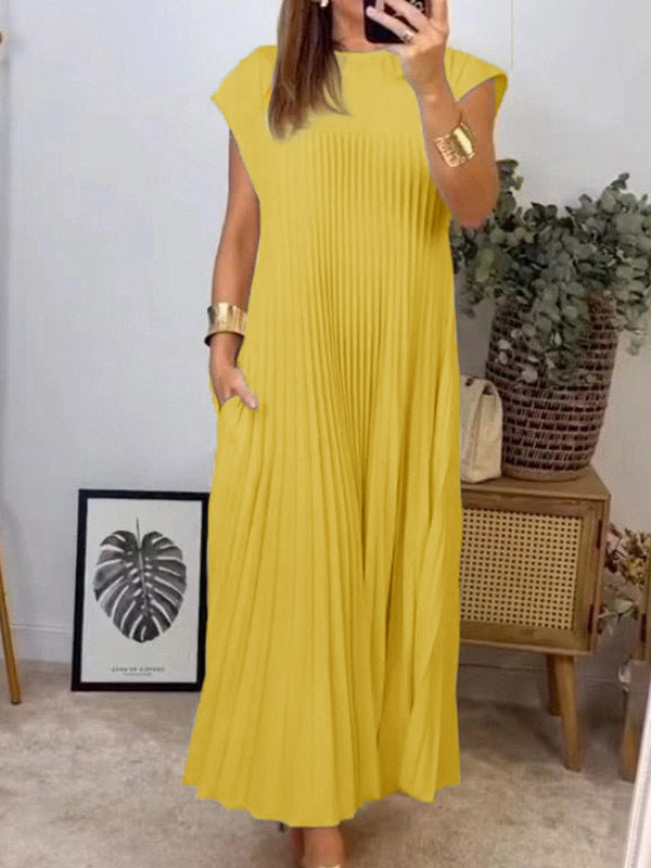 Robe longue plissée coupe trapèze, taille haute, à poches, à empiècements, à col rond, couleur unie