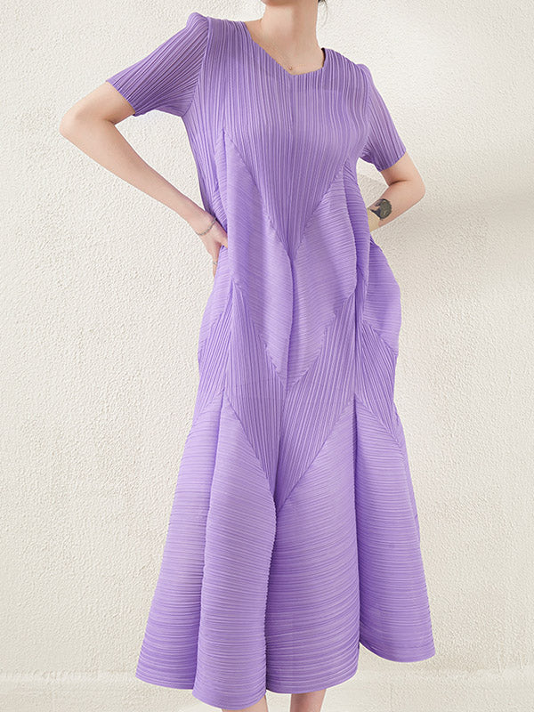 Robe mi-longue ample plissée taille haute, à col rond, couleur unie