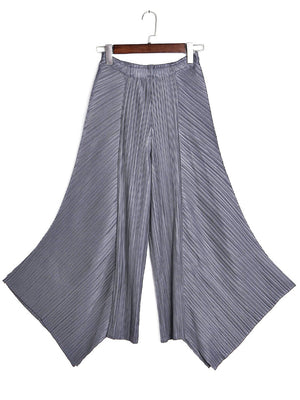 Pantalon ample original à jambes larges plissées irrégulières de couleur unie