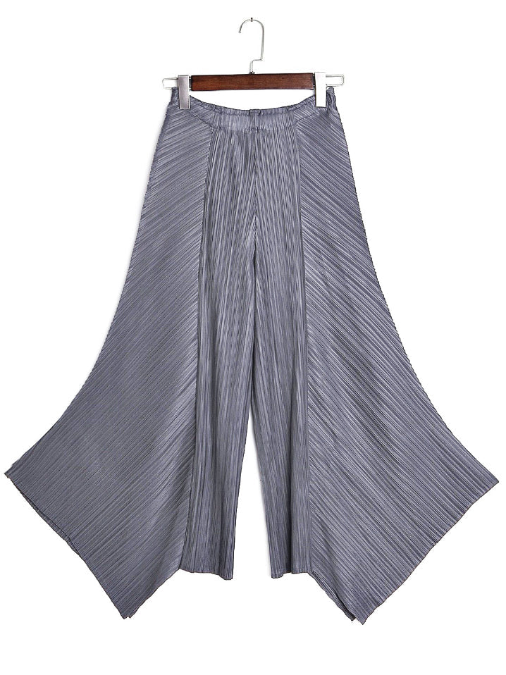 Pantalon ample original à jambes larges plissées irrégulières de couleur unie