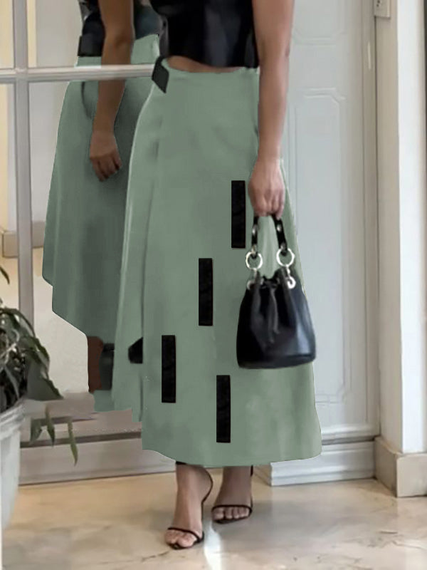 Jupe ample asymétrique coupe trapèze, à taille élastique, à poches, à empiècements
