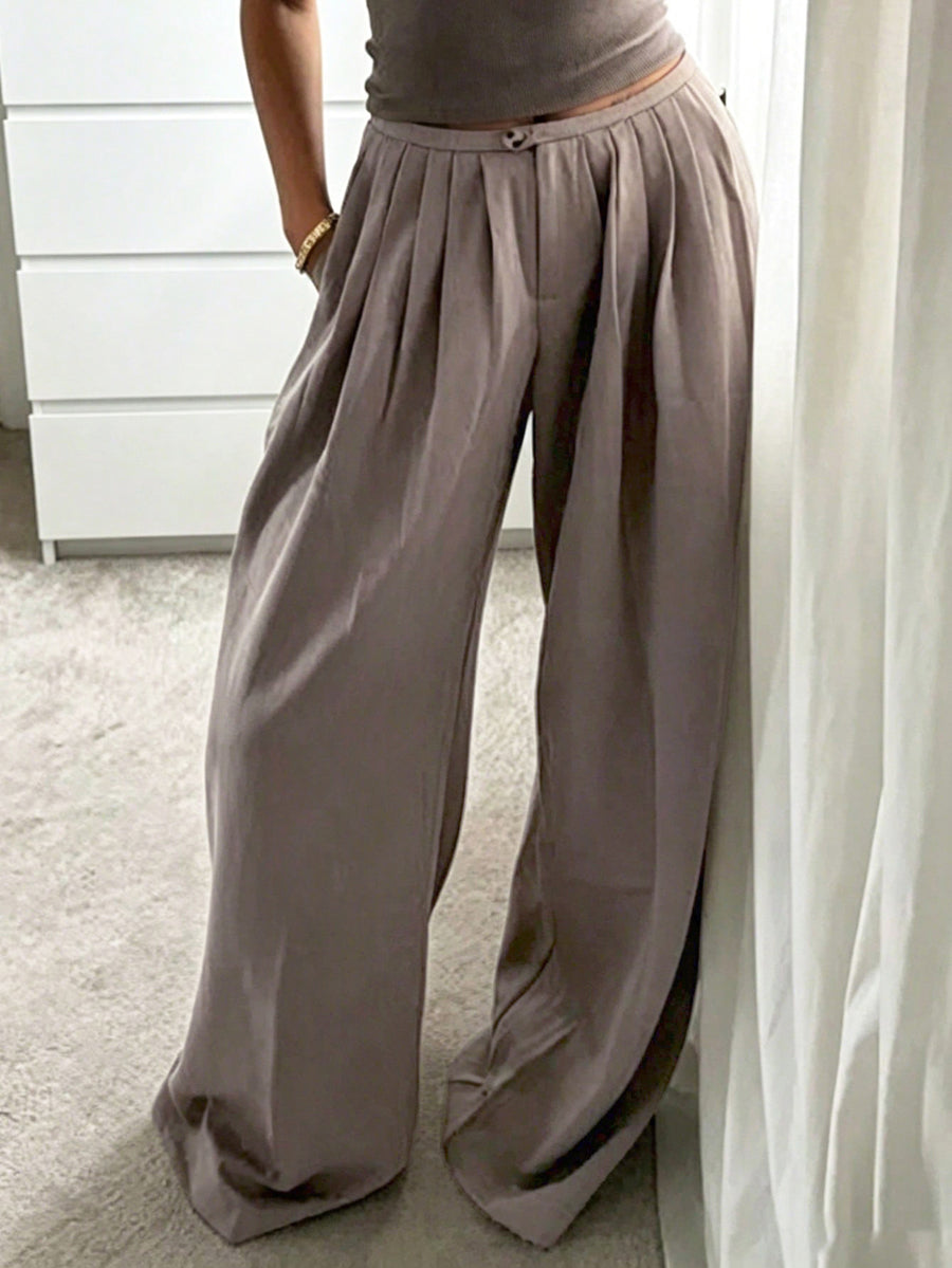 Pantalon plissé à jambes larges, taille haute, couleur unie