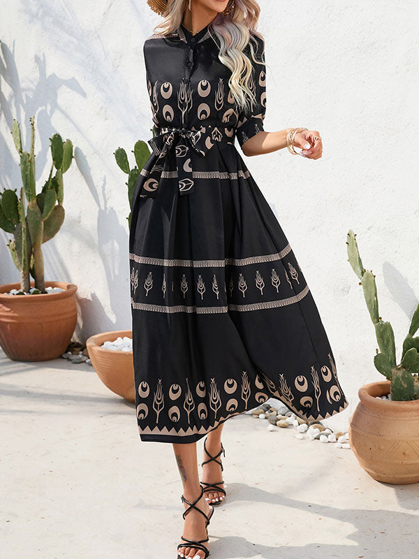 Robe mi-longue boutonnée coupe trapèze, à manches mi-longues, à taille nouée, à col revers