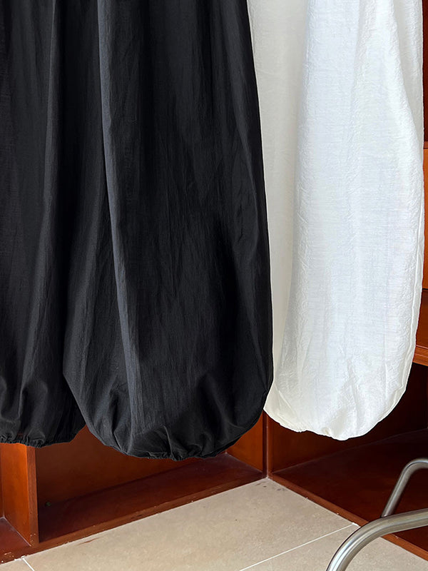Pantalon taille haute, à taille élastique, à empiècements, couleur unie
