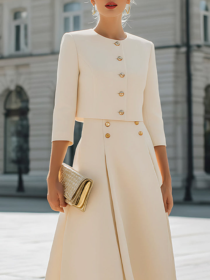 Veste boutonnée à manches trois-quarts, à col rond, couleur unie