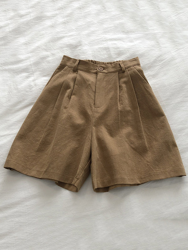 Short ample plissé à jambes larges, à taille élastique, couleur unie