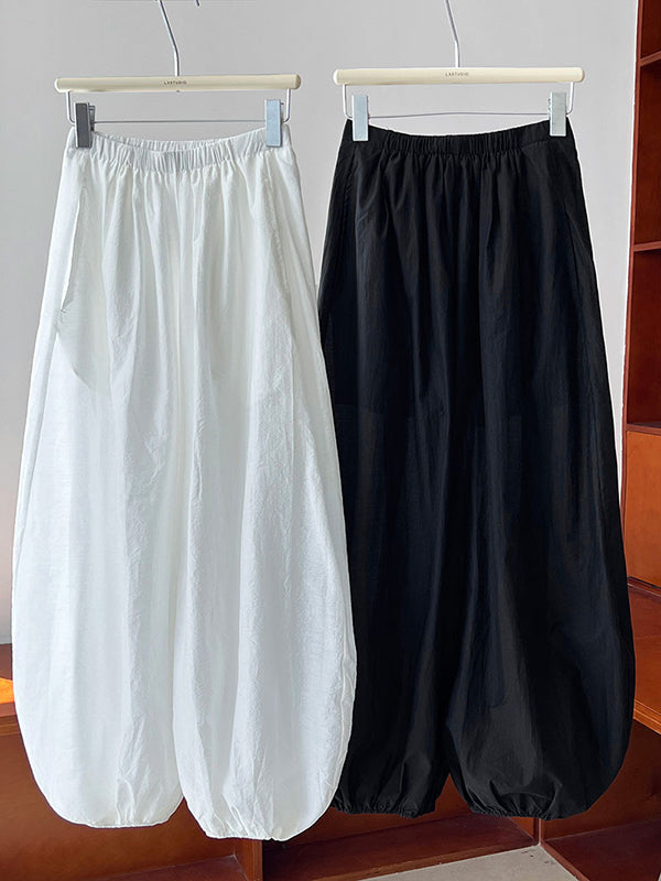 Pantalon taille haute, à taille élastique, à empiècements, couleur unie