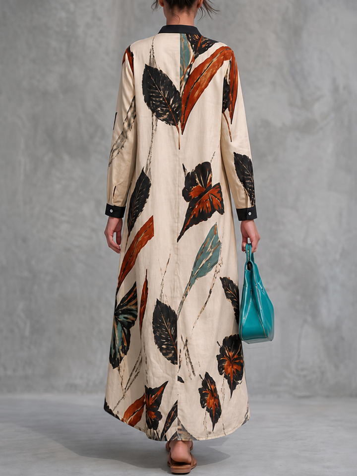 Robe chemise longue boutonnée ample à poches, à imprimé feuilles, à manches trois-quarts, à col cheminée