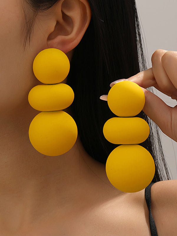 Boucles d'oreilles perlées géométriques couleur unie