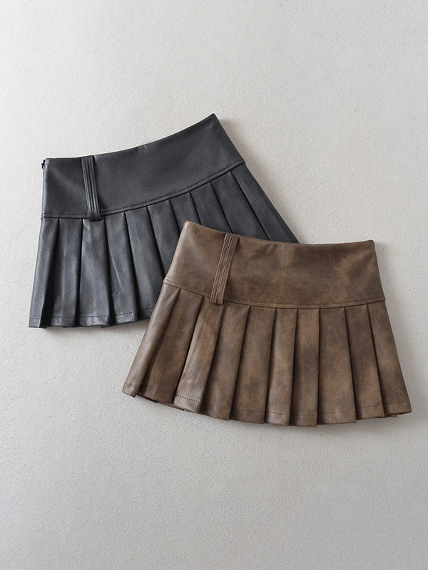 Jupe plissée coupe trapèze, taille haute, couleur unie
