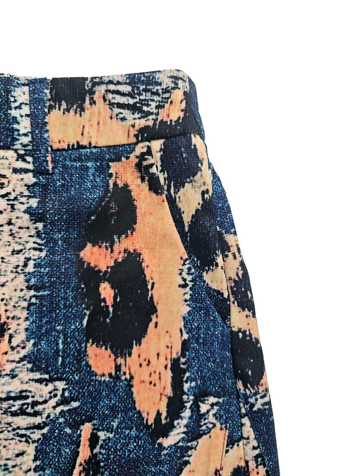 Pantalon ajouré boutonné à fermeture éclair, à empiècements, à poches, à imprimé léopard, à jambes larges, taille haute