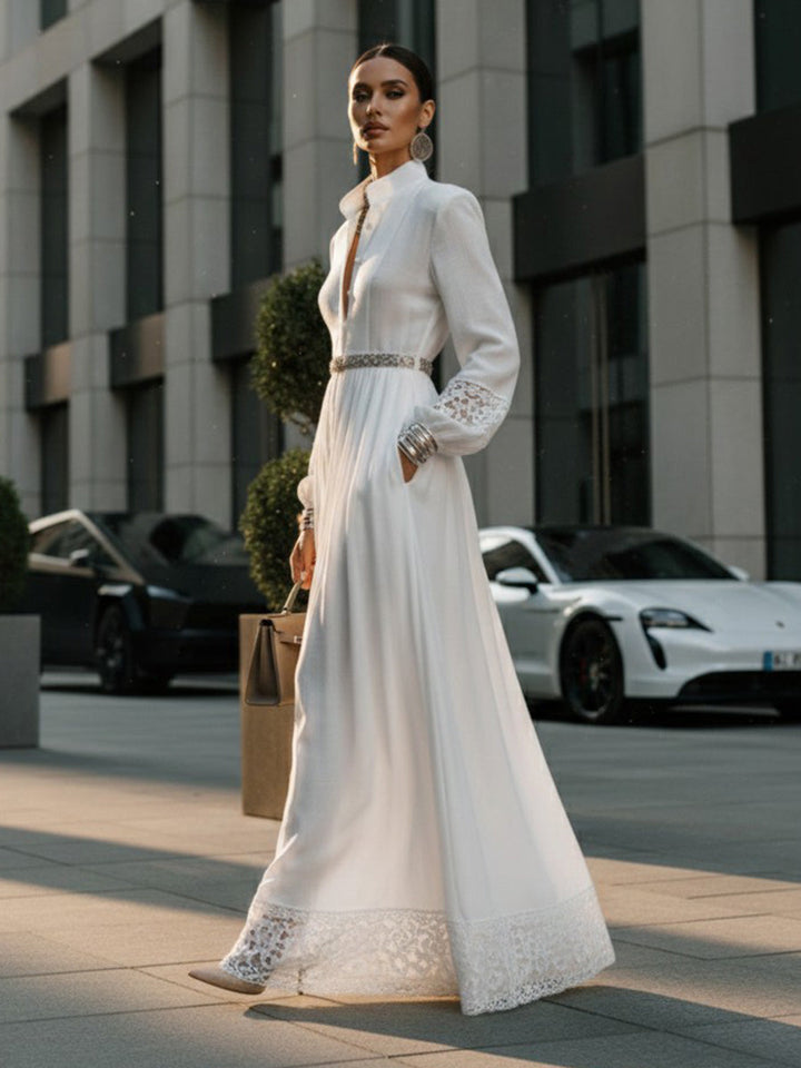 Robe chemise boutonnée ajourée plissée coupe trapèze, taille haute, avec ceinture, à poches, à empiècements, à col montant, couleur unie